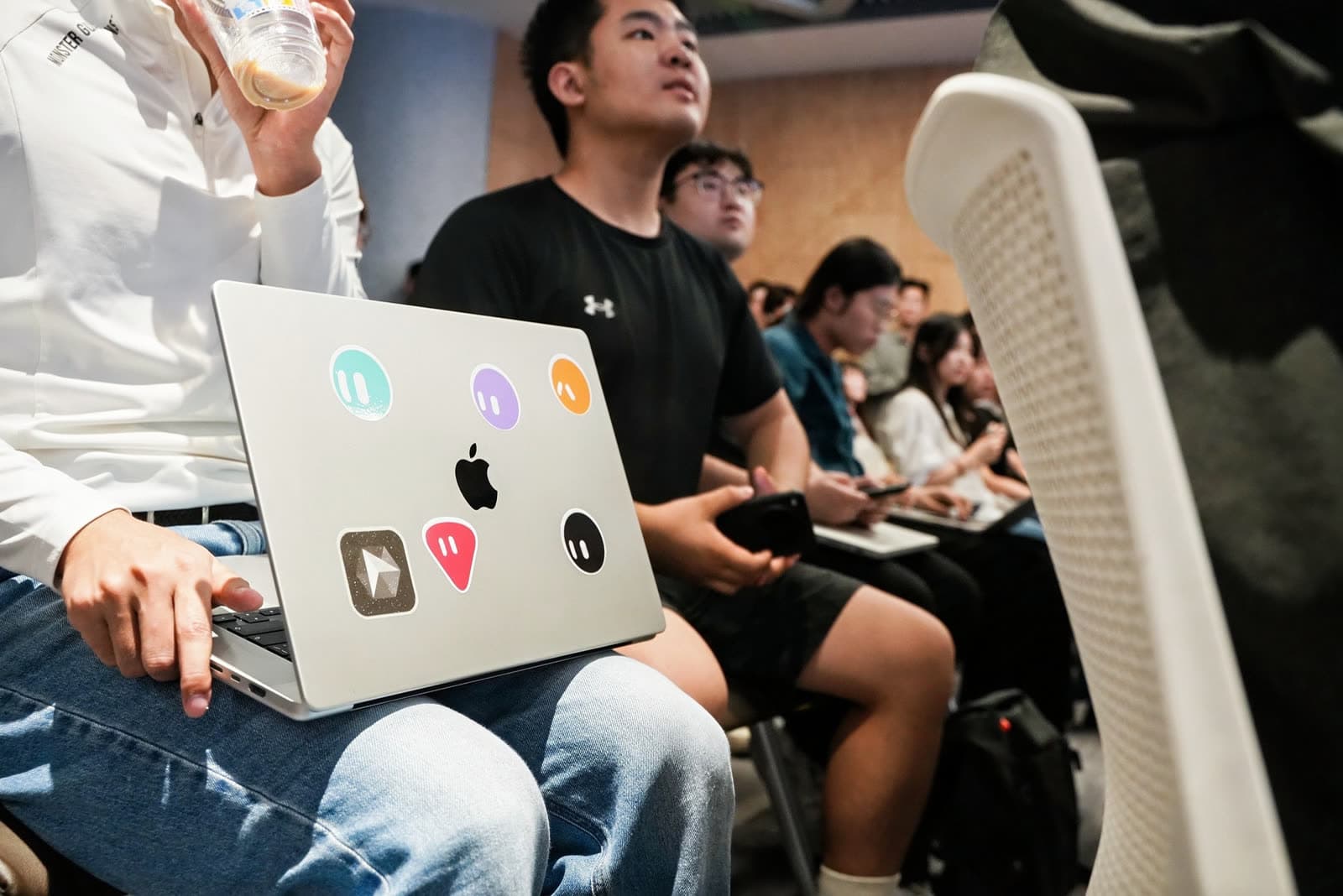 Grok Bot Meetup Beijing: laptop with Bot stickers